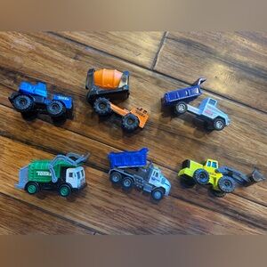 6 Tonka Work Trucks. Metal/plastic parts. Played with but in very good condition
